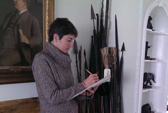 Artist Alison Nicholls sketching in the Roosevelt Room.